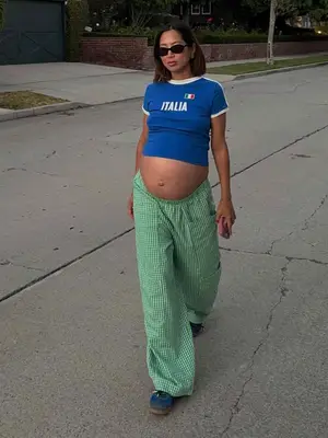 model wearing white maxi skirt