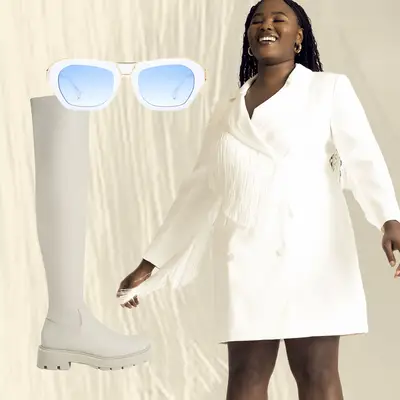 White blazer dress with fringe detail, white lug sole thigh high boots, and sunglasses with blue lenses