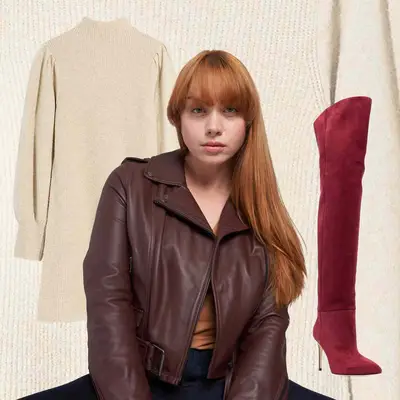 Ivory knit dress, brown leather jacket, and red thigh high boots