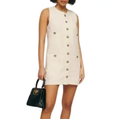 Reformation Tropez Denim Mini Dress in fior di latte off-white on model styled with black handbag