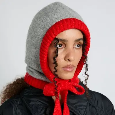 Damson Madder Hood in gray marl with red tie on model