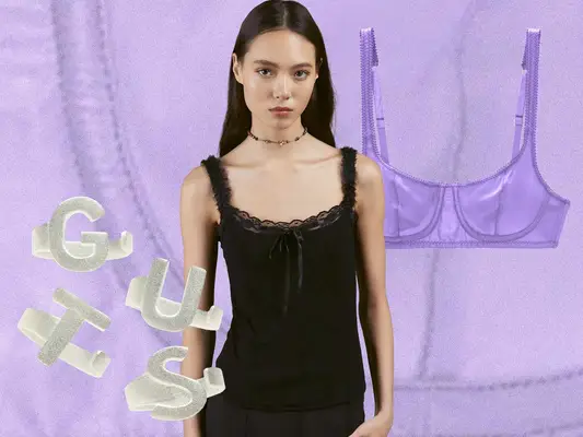 Purple bra, model wearing black tank top, and silver Olivia Rodrigo GUTS rings