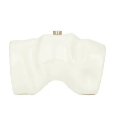 pearl colored acrylic clutch with structured frame with lift clasp closure against plain background