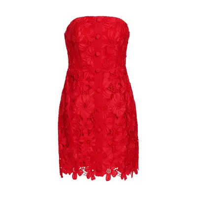 model wearing gray sweater against plain background