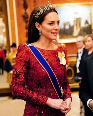 Princess Kate wearing The Lotus Flower Tiara and an embroidered red gown