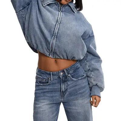 Good American Denim Bomber Jacket in light wash on model