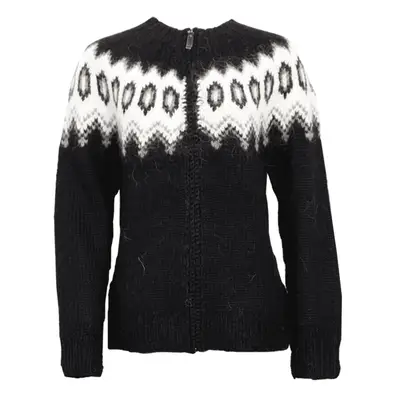 Lorelai Gilmore wears a neutral turtleneck rib knit sweater and curled hairstyle