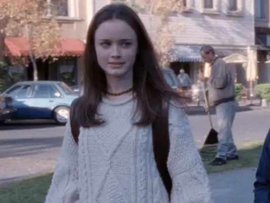Rory Gilmore wearing a white cable knit sweater