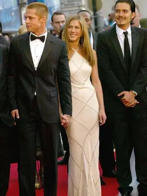 Jennifer Aniston wears an ivory Versace gown with sparkly diamond pattern at the 2004 Cannes Film Festival 