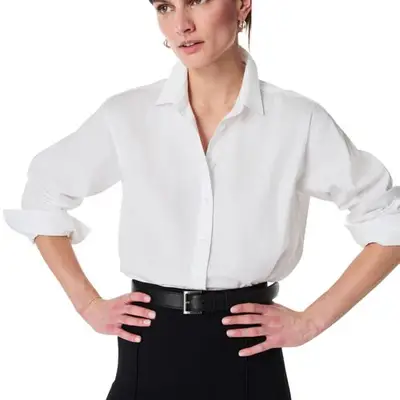 person wearing white button down shirt