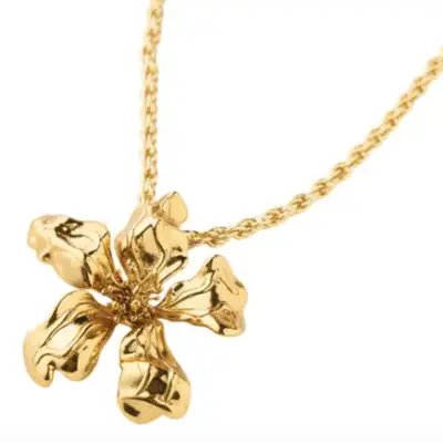 gold necklace with flower charm