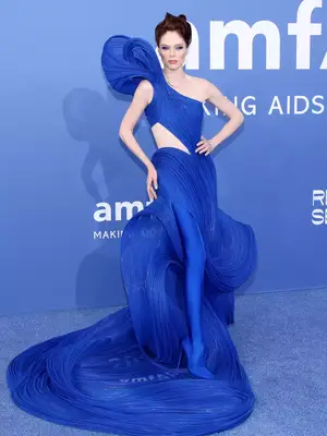Coco Rocha wears a structural blue Gaurav Gupta couture gown to the 2023 amfAR Cannes Gala