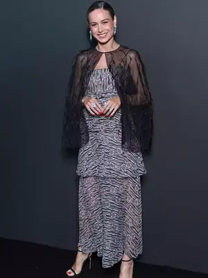 Brie Larson wears a Chanel cape and dress to the 2023 Cannes Film Festival