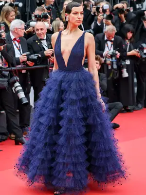 Irina Shayk wears a tiered navy tulle Armani gown at the 2023 Cannes Film Festival