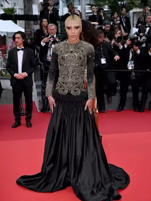 Bilal Hassani wears an Alexander McQueen fall 2010 embroidered gown to the 2023 Cannes Film Festival
