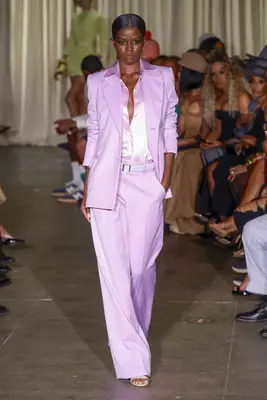 Model wears a lilac suit on the Sergio Hudson Spring 2025 runway