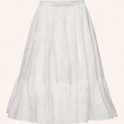 Close up of a white maxi circle skirt 