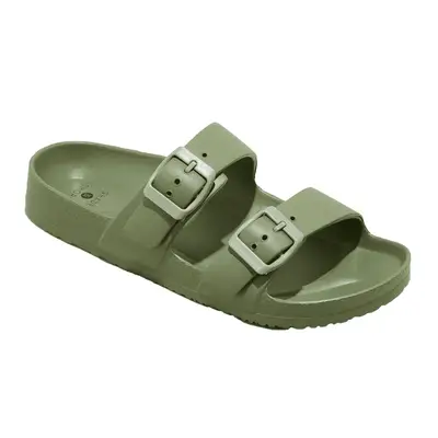 Two pairs of two-strap sandals on neutral floor