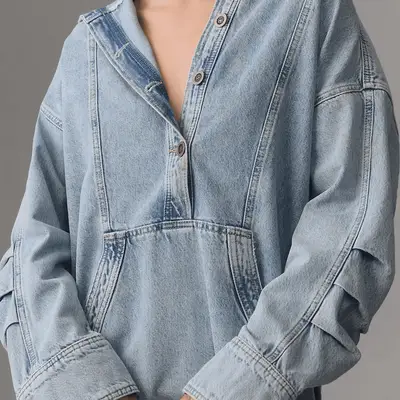Pilcro Hooded Denim Popover Top in light wash on model