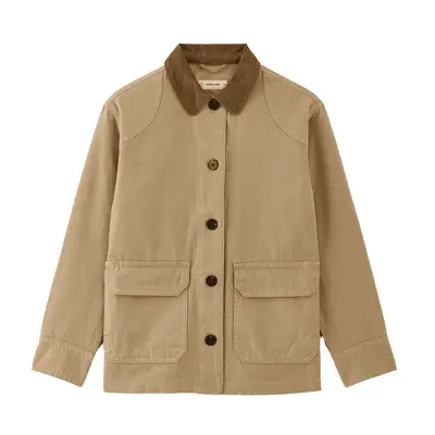 Matilda Djerf wears a brown quilted barn jacket, white t-shirt, jeans, sunglasses, and brown bandana