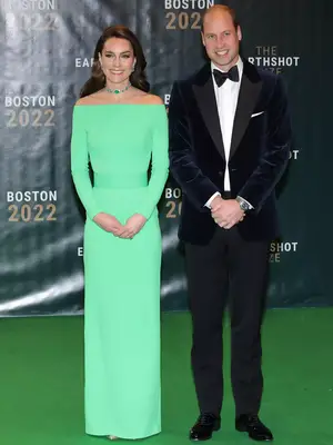 Kate Middleton wearing a lime green gown and emerald jewelry