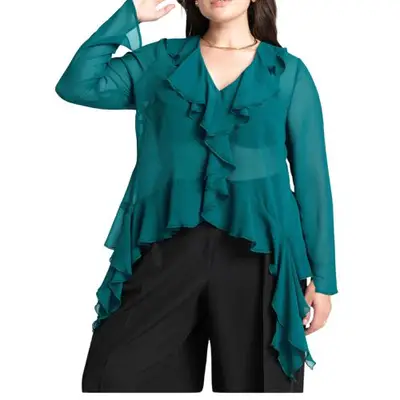 model wearing a teal green ruffled blouse