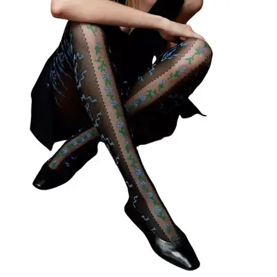 model wearing tights with blue flower design