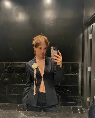 woman wearing a corsage