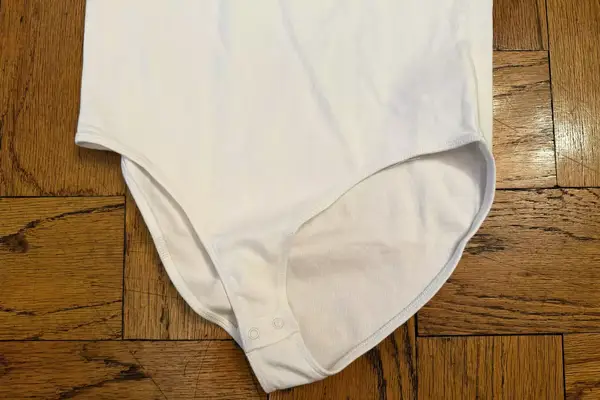 The snap button closure on the bottom of the Gap Modern T-Shirt Bodysuit