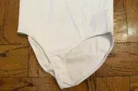 The snap button closure on the bottom of the Gap Modern T-Shirt Bodysuit