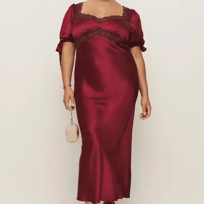 Reformation x Kacey Musgraves Stella Silk Dress in crimson clover red on model