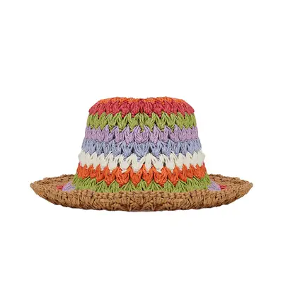 Model wearing black satin shorts and pink patterned top