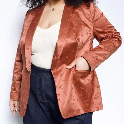 Wildfang The Empower Tux Blazer in terra cotta on model styled with white tank top and jeans