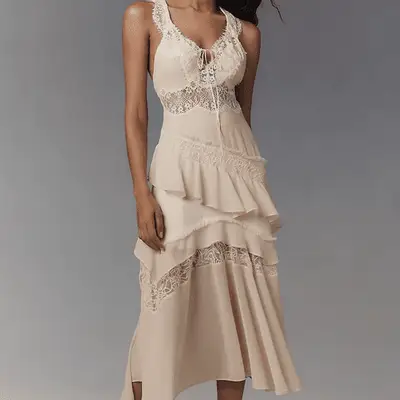 By Anthropologie Sleeveless Keyhole Tiered Lace Midi Dress in ivory on model