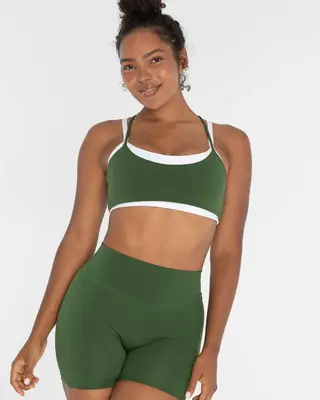 model wearing green activewear
