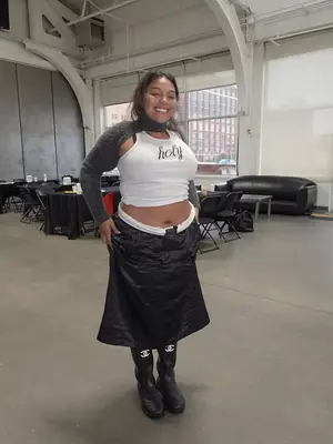 Paloma Elsesser wears a white 