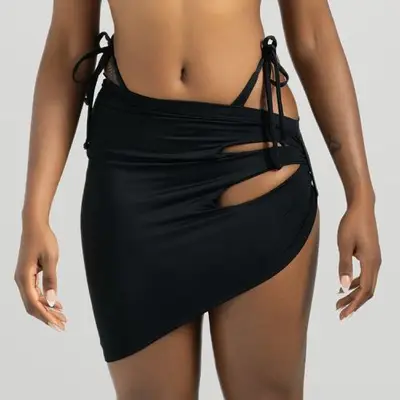 RJ Swim Raven Cut Out Skirt in black styled with swimsuit