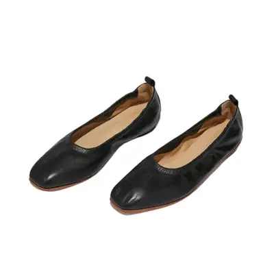 pair of black Zou Xou ballet flats