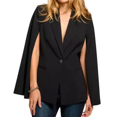 person wearing a black blazer cape