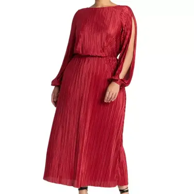 person wearing a long plisse red dress