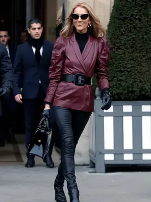 Celine Dion wearing a flower-patterned two piece jacket set walking in the streets of New York