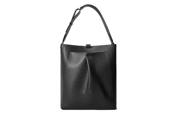 The Katte Vintage Genuine Leather Tote Shoulder Bag sitting on a wooden table