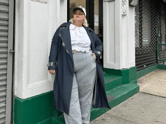 woman wearing denim trench coat