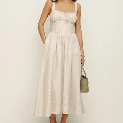 Reformation Balia Linen Dress in sandy stripe on model