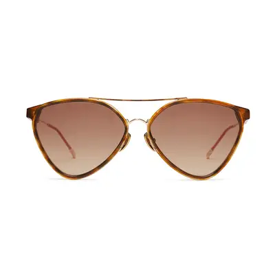 Daisy Edgar-Jones wears a ribbed tank top, sunglasses, and Hunter boots