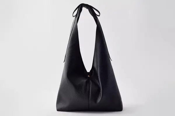 Urban Outfitters Kimchi Blue Bow Faux Leather Hobo Bag