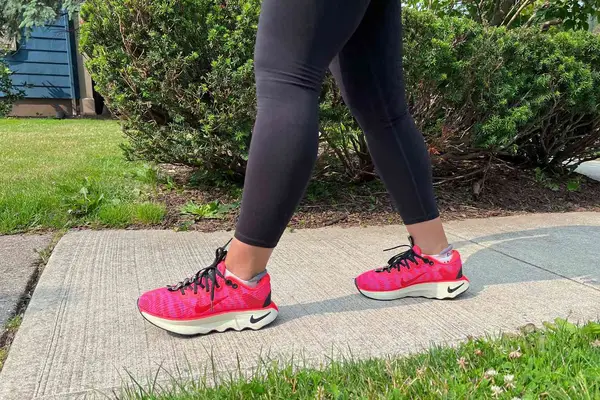 Feet wearing Nike Motiva Women