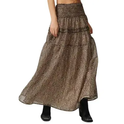Sister Jane Lisette Leopard Print Midi Skirt on model in flowing style styled with black boots