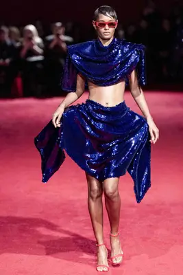 Model wears two-piece cobalt sequined skirt set from Christian Siriano