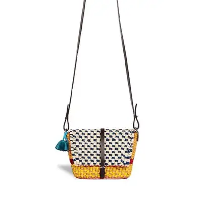 A yellow woven bag on a strap